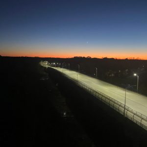 Aerial view of bridge during early evening 