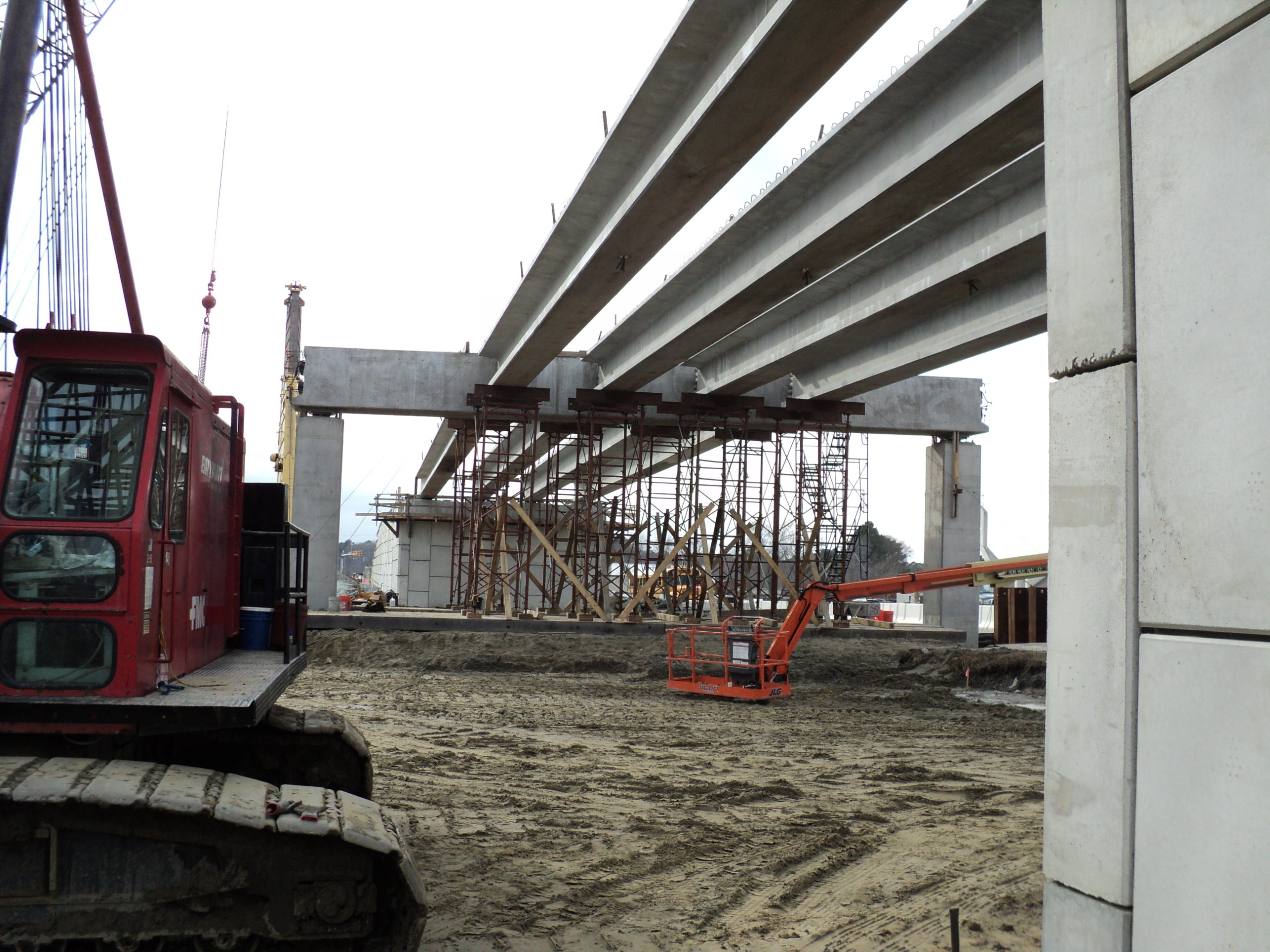 Post-tensioned 45" tall Precast Bulb T beams and temporary shoring towers