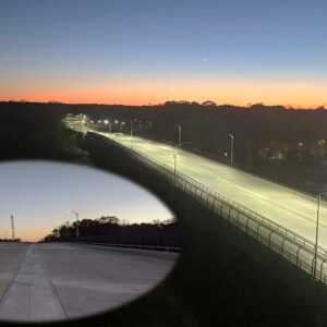 Aerial view of bridge during early evening 