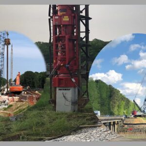 Driving a 24" concrete test pile ,200-ton Link Belt crane driving piles from temporary work bridge.