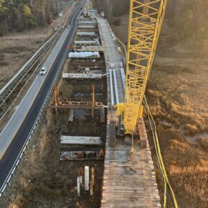 Substructure construction from temporary work trestle.